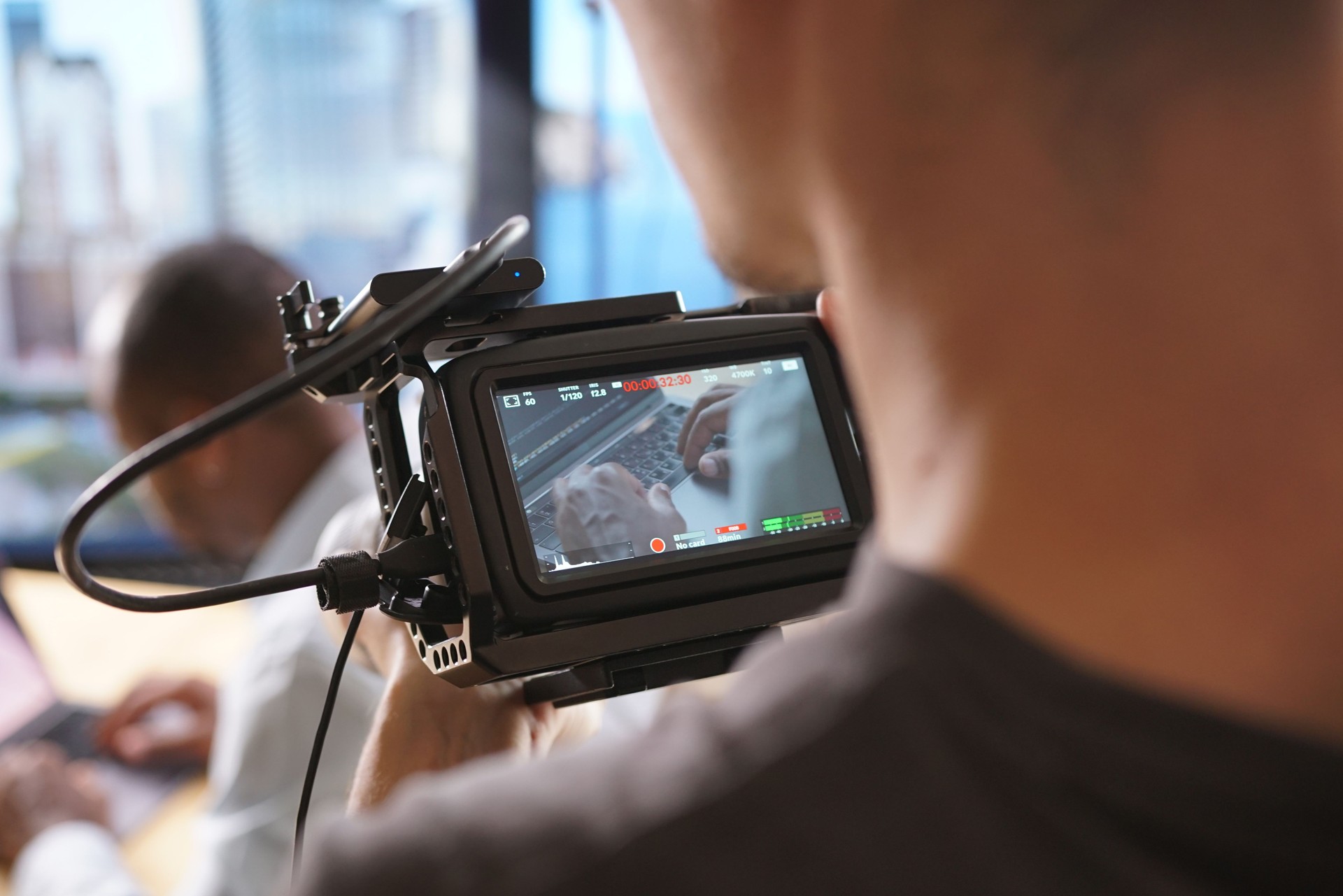 Close-up of the shooting camera and the working operator