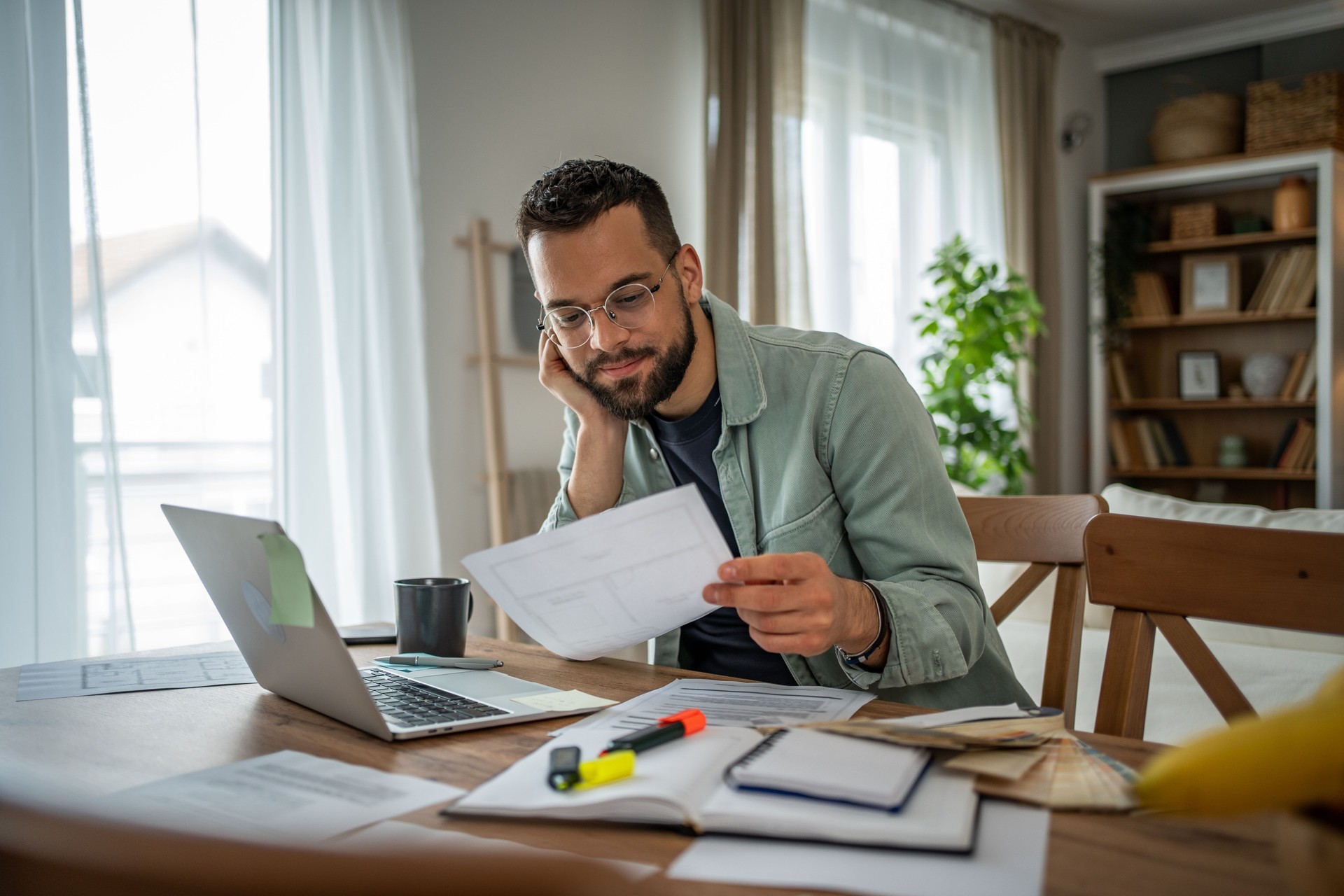 Freelancer enjoying the flexibility of remote work in his home office